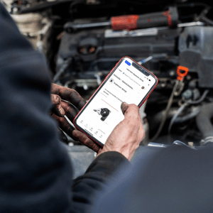 person holding a phone with Today's Class training displayed on the screen 